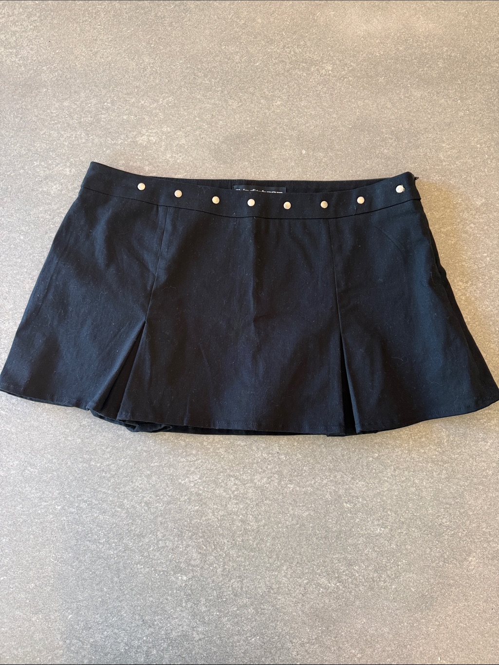 Stud-Trim Black Pleated Mini Skort
